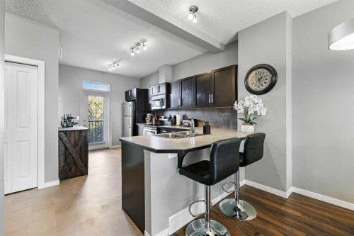 68 New Brighton Point Se, Calgary, AB - Indoor Photo Showing Kitchen
