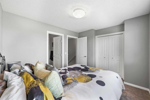 68 New Brighton Point Se, Calgary, AB - Indoor Photo Showing Bedroom