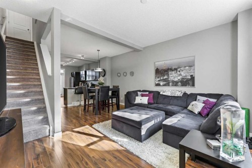 68 New Brighton Point Se, Calgary, AB - Indoor Photo Showing Living Room