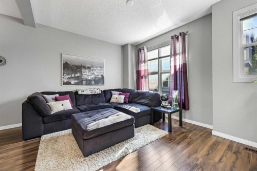 68 New Brighton Point Se, Calgary, AB - Indoor Photo Showing Living Room