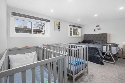 255 Rundleridge Drive Ne, Calgary, AB - Indoor Photo Showing Bedroom