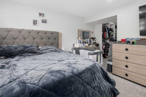 255 Rundleridge Drive Ne, Calgary, AB - Indoor Photo Showing Bedroom