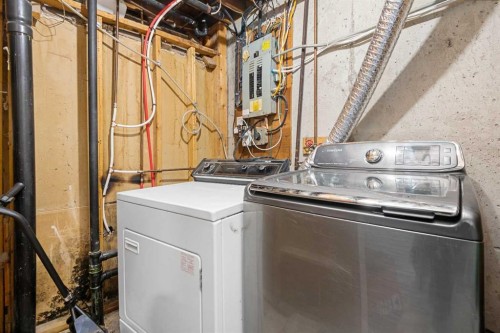 255 Rundleridge Drive Ne, Calgary, AB - Indoor Photo Showing Laundry Room