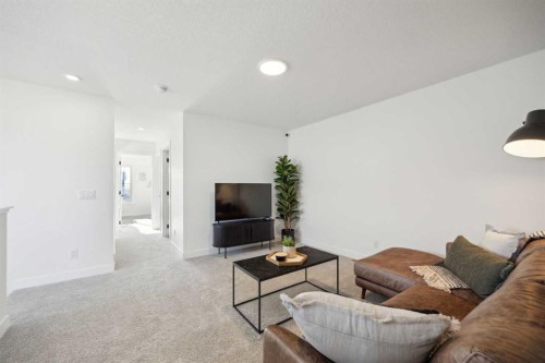 213 Southbow Drive, Cochrane, AB - Indoor Photo Showing Living Room
