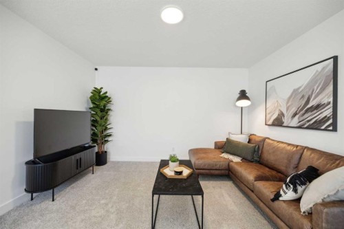 213 Southbow Drive, Cochrane, AB - Indoor Photo Showing Living Room