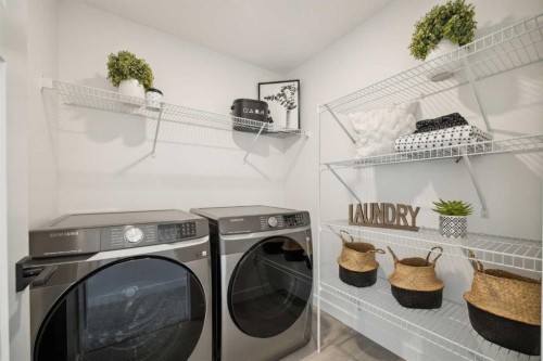 213 Southbow Drive, Cochrane, AB - Indoor Photo Showing Laundry Room