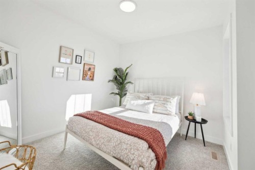 213 Southbow Drive, Cochrane, AB - Indoor Photo Showing Bedroom