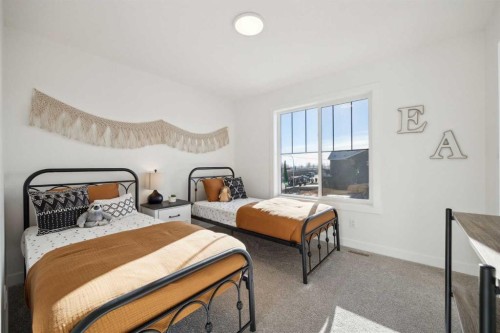 213 Southbow Drive, Cochrane, AB - Indoor Photo Showing Bedroom