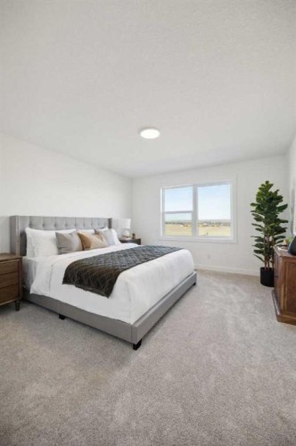 213 Southbow Drive, Cochrane, AB - Indoor Photo Showing Bedroom