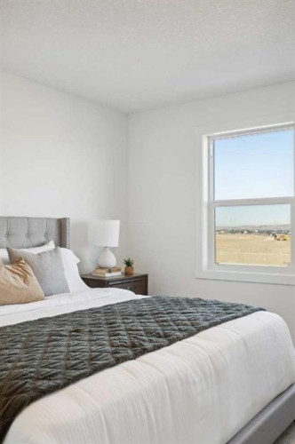 213 Southbow Drive, Cochrane, AB - Indoor Photo Showing Bedroom
