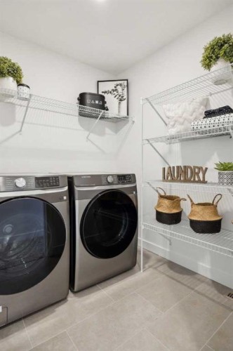 213 Southbow Drive, Cochrane, AB - Indoor Photo Showing Laundry Room