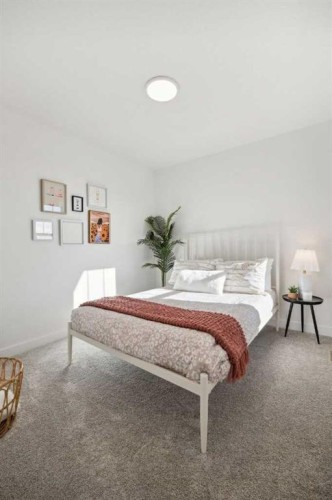 213 Southbow Drive, Cochrane, AB - Indoor Photo Showing Bedroom