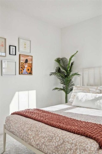 213 Southbow Drive, Cochrane, AB - Indoor Photo Showing Bedroom