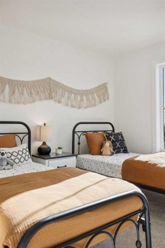 213 Southbow Drive, Cochrane, AB - Indoor Photo Showing Bedroom