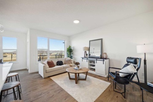 213 Southbow Drive, Cochrane, AB - Indoor Photo Showing Living Room