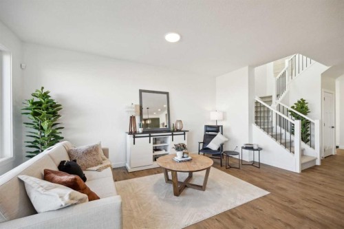 213 Southbow Drive, Cochrane, AB - Indoor Photo Showing Living Room
