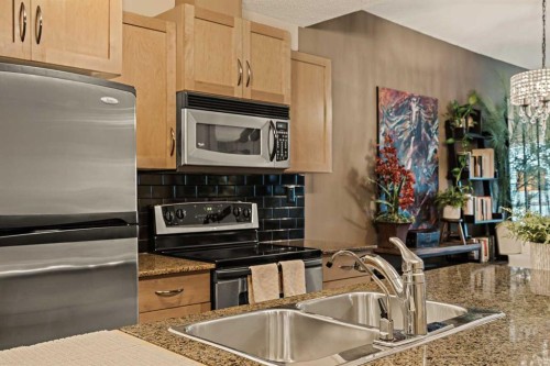 1411-5605 Henwood Street Sw, Calgary, AB - Indoor Photo Showing Kitchen With Double Sink