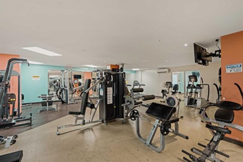 1411-5605 Henwood Street Sw, Calgary, AB - Indoor Photo Showing Gym Room