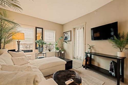 1411-5605 Henwood Street Sw, Calgary, AB - Indoor Photo Showing Living Room