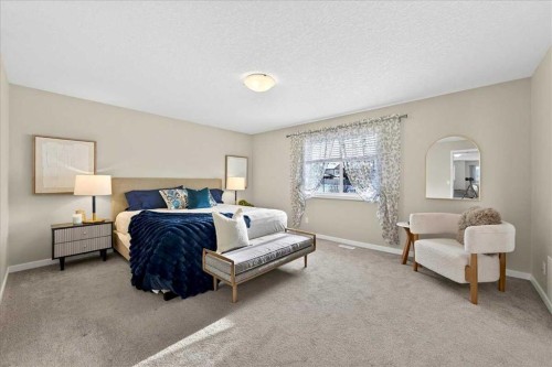 180 Kinlea Link Nw, Calgary, AB - Indoor Photo Showing Bedroom