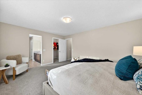 180 Kinlea Link Nw, Calgary, AB - Indoor Photo Showing Bedroom