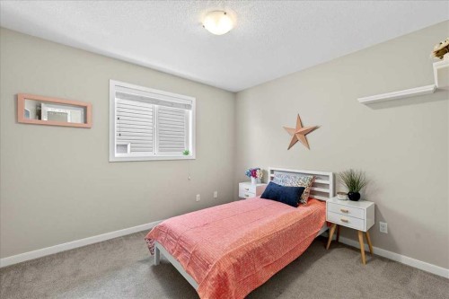180 Kinlea Link Nw, Calgary, AB - Indoor Photo Showing Bedroom