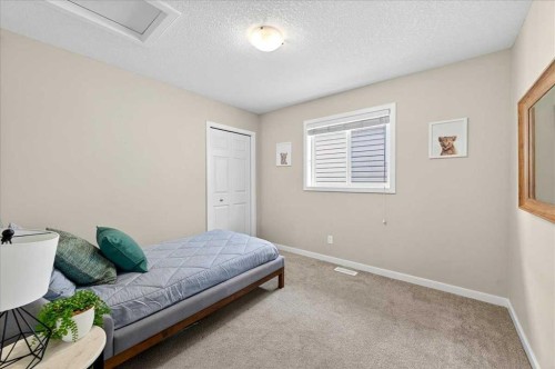 180 Kinlea Link Nw, Calgary, AB - Indoor Photo Showing Bedroom