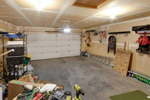200 Cimarron Drive, Okotoks, AB - Indoor Photo Showing Garage
