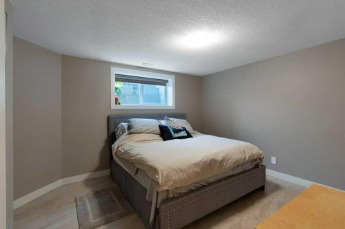 200 Cimarron Drive, Okotoks, AB - Indoor Photo Showing Bedroom