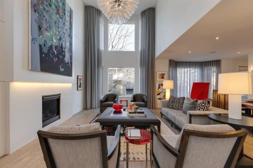 329 11 Street Nw, Calgary, AB - Indoor Photo Showing Living Room With Fireplace