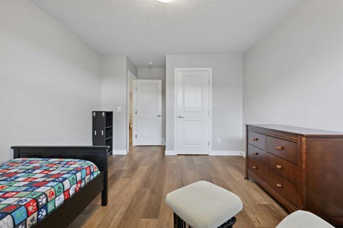 41 Seton Grove Se, Calgary, AB - Indoor Photo Showing Bedroom