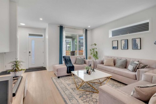 190 Dawson Harbour Rise, Chestermere, AB - Indoor Photo Showing Living Room