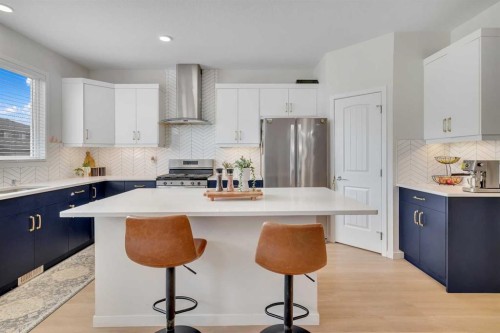 190 Dawson Harbour Rise, Chestermere, AB - Indoor Photo Showing Kitchen With Upgraded Kitchen