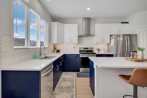 190 Dawson Harbour Rise, Chestermere, AB - Indoor Photo Showing Kitchen With Double Sink With Upgraded Kitchen