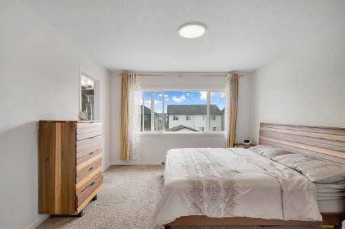 190 Dawson Harbour Rise, Chestermere, AB - Indoor Photo Showing Bedroom