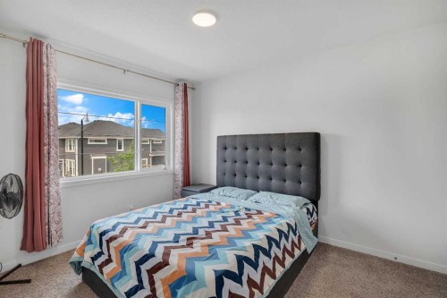 190 Dawson Harbour Rise, Chestermere, AB - Indoor Photo Showing Bedroom