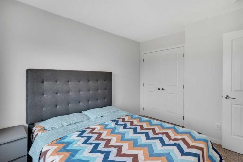 190 Dawson Harbour Rise, Chestermere, AB - Indoor Photo Showing Bedroom