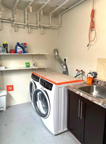 2208 20 Avenue Nw, Calgary, AB - Indoor Photo Showing Laundry Room
