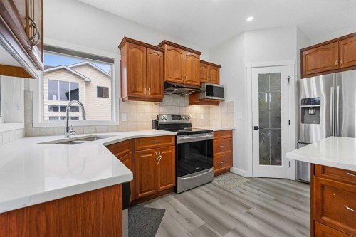 280 Windermere Drive, Chestermere, AB - Indoor Photo Showing Kitchen With Stainless Steel Kitchen With Double Sink With Upgraded Kitchen