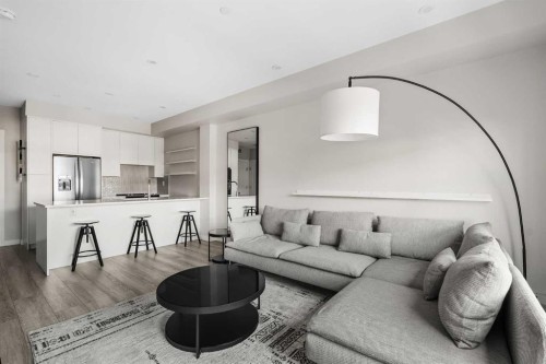 308-4160 Norford Avenue Nw, Calgary, AB - Indoor Photo Showing Living Room