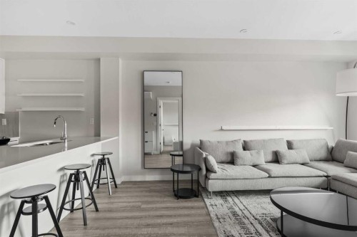 308-4160 Norford Avenue Nw, Calgary, AB - Indoor Photo Showing Living Room