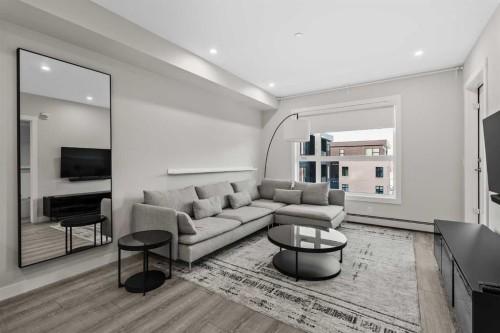 308-4160 Norford Avenue Nw, Calgary, AB - Indoor Photo Showing Living Room