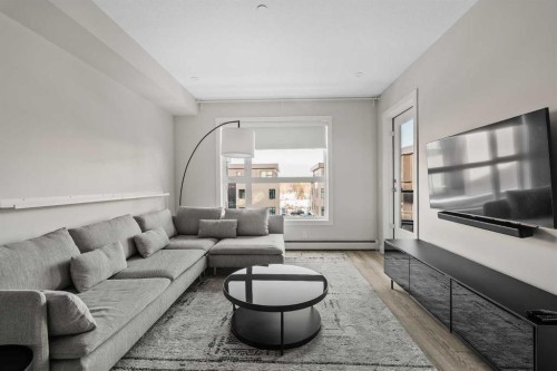308-4160 Norford Avenue Nw, Calgary, AB - Indoor Photo Showing Living Room