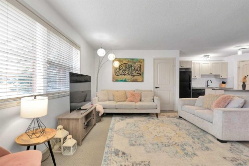 101-120 Panatella Landing Nw, Calgary, AB - Indoor Photo Showing Living Room