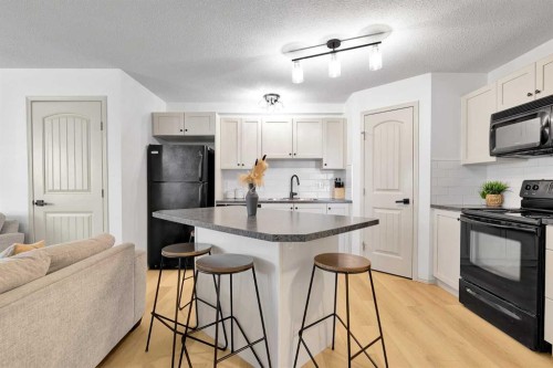 101-120 Panatella Landing Nw, Calgary, AB - Indoor Photo Showing Kitchen
