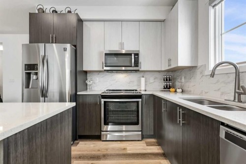 3114-298 Sage Meadows Park Nw, Calgary, AB - Indoor Photo Showing Kitchen With Stainless Steel Kitchen With Double Sink With Upgraded Kitchen