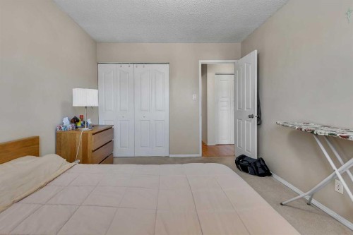 301-6464 Travois Crescent Nw, Calgary, AB - Indoor Photo Showing Bedroom