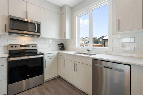 122 Homestead Boulevard Ne, Calgary, AB - Indoor Photo Showing Kitchen With Stainless Steel Kitchen With Double Sink With Upgraded Kitchen