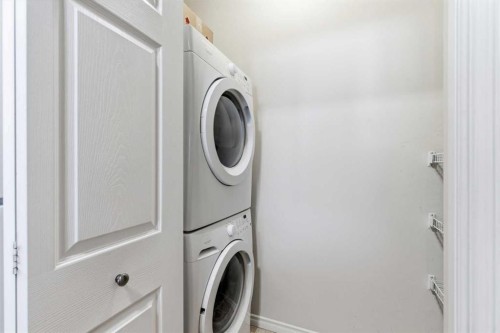 1302-1010 Arbour Lake Road Nw, Calgary, AB - Indoor Photo Showing Laundry Room