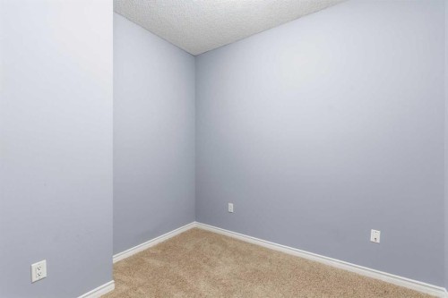 1302-1010 Arbour Lake Road Nw, Calgary, AB - Indoor Photo Showing Other Room